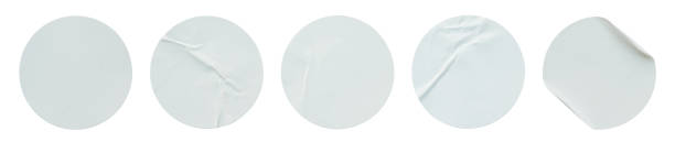 istock A set of blank white round adhesive paper sticker label isolated on white background. 2160660310