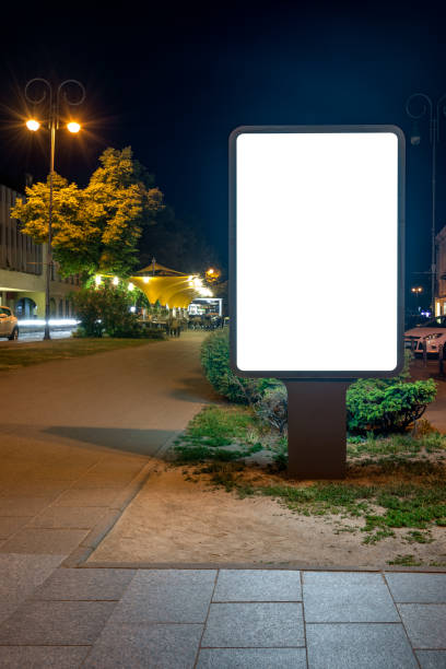 istock Blank Billboard Mockup On Pedestrian Street At Night 2160661297