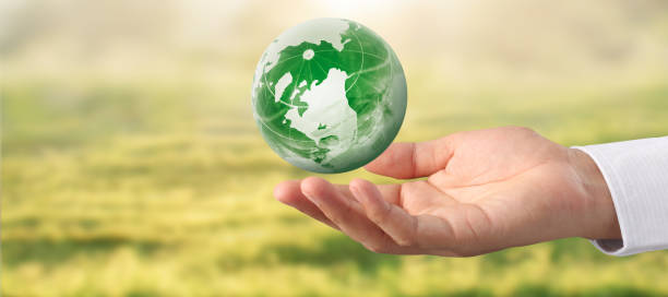 istock Globe ,earth in human hand, holding our planet glowing. Earth image provided by Nasa 2160663236