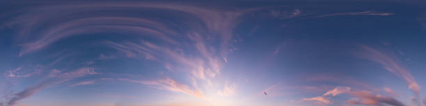 istock Sunset sky panorama, pink Cirrus clouds, seamless 360 hdr equirectangular, great for virtual reality projects and sky replacement. Weather and climate change 2160672175