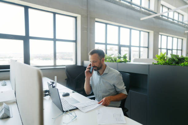 istock Mid adult man in the office 2160673979