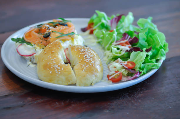 Various types of bagel served on plate in the restaurant