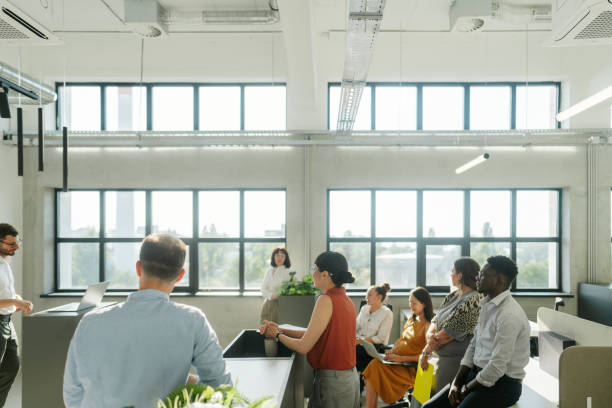 istock A man leading the meeting with his presentation 2160679989