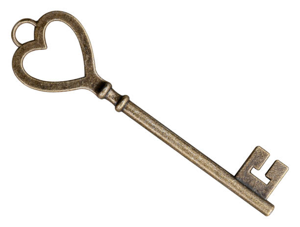 istock Golden heart shaped key isolated on white background with clipping path 2160680005