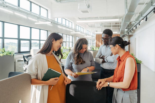 istock Group of diverse people working together 2160680072