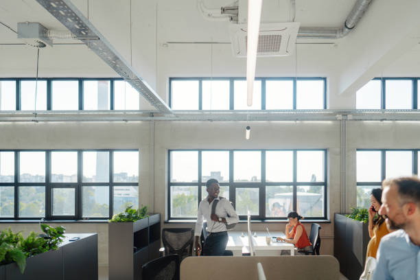 Photo of a group of diverse people working together in the same company