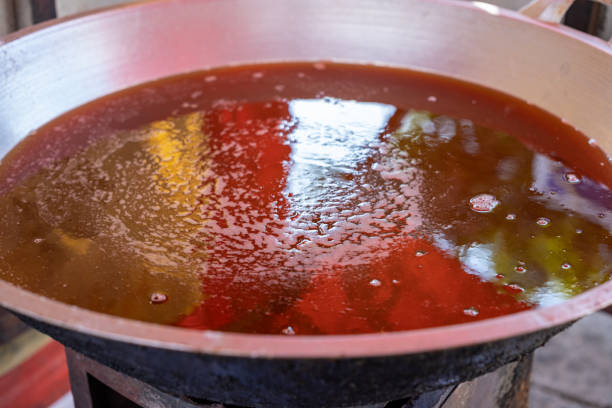 istock hot cooking oil in a frying pan 2160681484