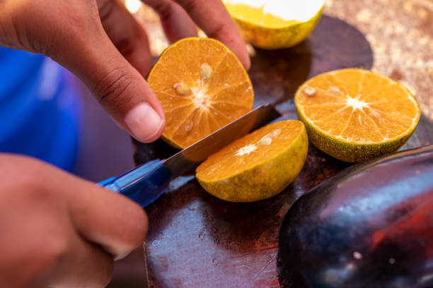 Making Orange juice - drink preparation.