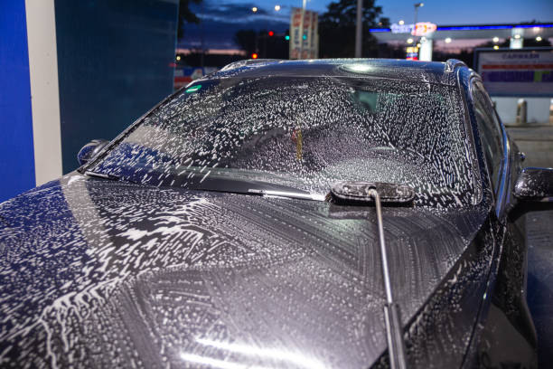 istock car washing with foam and brush on it 2160685178