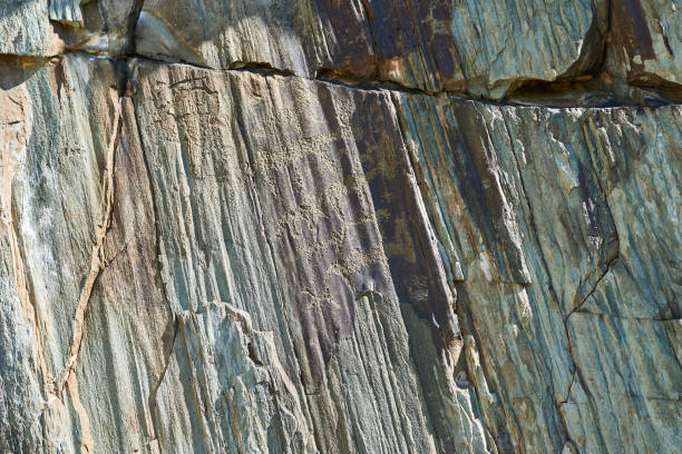 istock Close-up of rock paintings on a stone wall. 2160686483