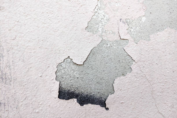 istock Cracked Peeling Paint on Concrete Wall Texture for Background or Design 2160686550