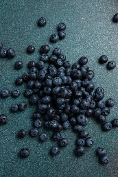 istock Fresh ripe blueberries as background, top view. 2160688380