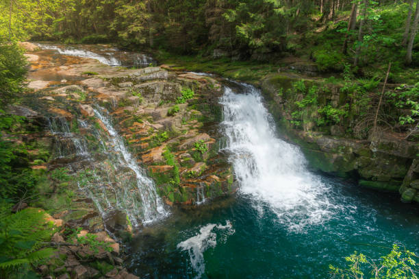 istock Krkonose mountains - waterfall scenic nature moss green background - white wild water falling from rocks making romantic veils. KRNAP (Krkonossky National Park), Czech Republic 2160689101