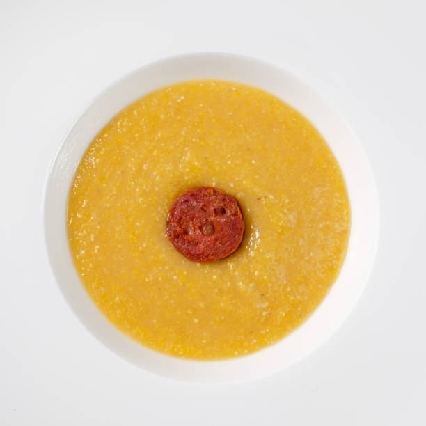 istock Polenta with butter and parmesan cheese in a plate 2160689483