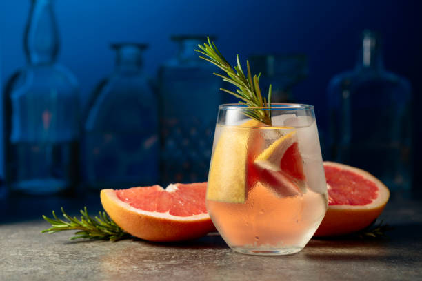 istock Cocktail gin tonic with ice, rosemary, and grapefruit. 2160692657