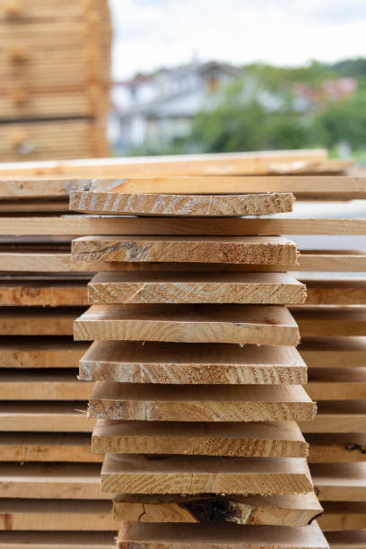 istock Stacked wooden planks in various shades and textures. 2160693442
