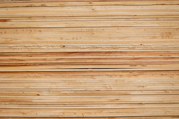Wooden blocks lie diagonally. Background with copy space. Environmentally friendly building materials.