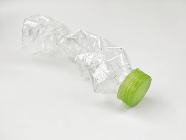 istock Used plastic bottles isolated in white background 2160694358