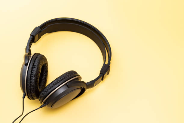 istock Headphones on a yellow background 2160697478