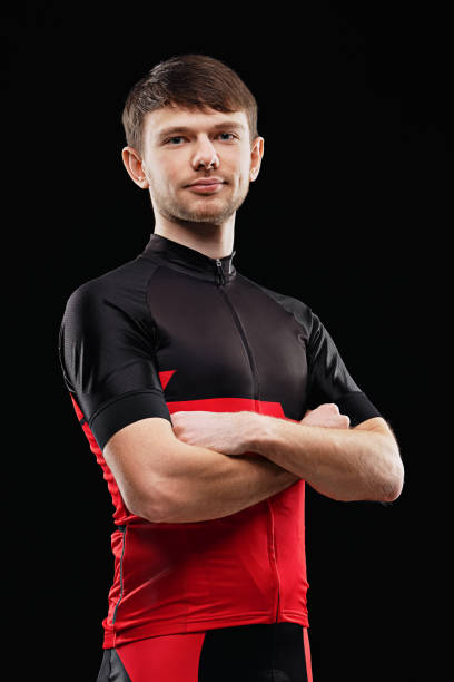 istock Sport. Cyclist in training clothes on black background. 2160701294