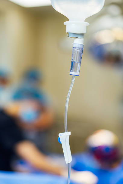 istock Operating system infusion. Medical dropper system close up. 2160702064
