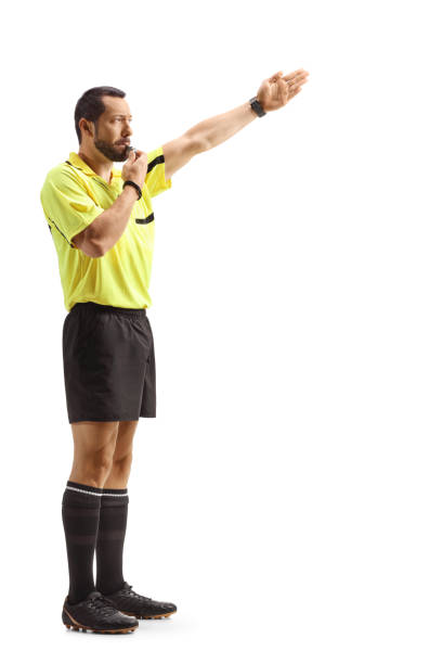 istock Football referee blowing a whistle and showing offside 2160703091