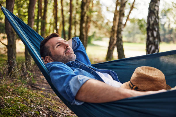 istock Relaxed adult man in hammock 2160707226