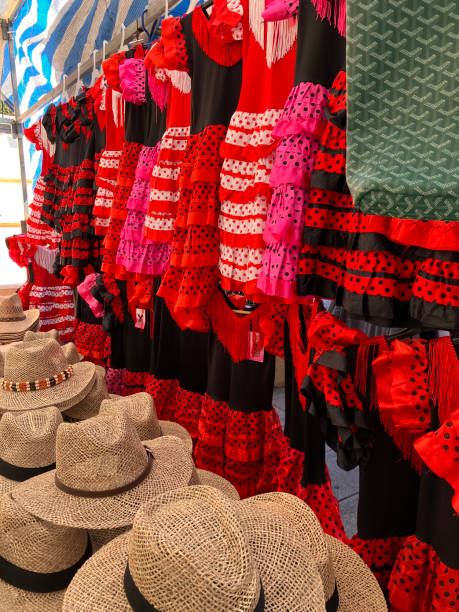 istock Sapnish dreesed and hats on market stall, Javea, Spain 2160707580