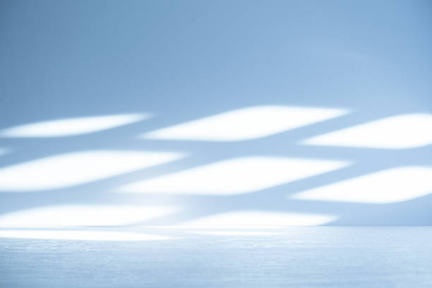 istock Wall interior background, studio, and backdrops show products. with shadow from window color white and blue light. background for text insertion and presentation of product 2160707896