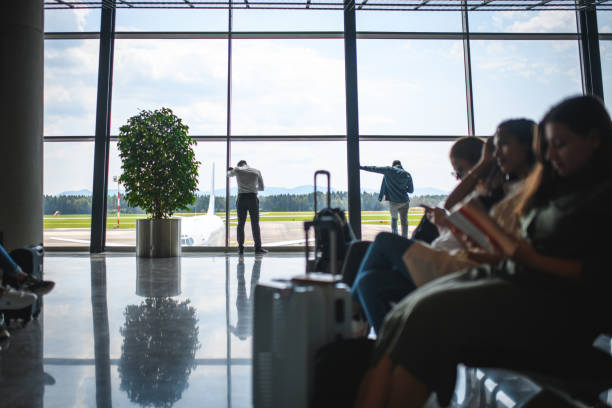 istock Diverse Group Of People Waiting For A Plane To Arrive 2160708213