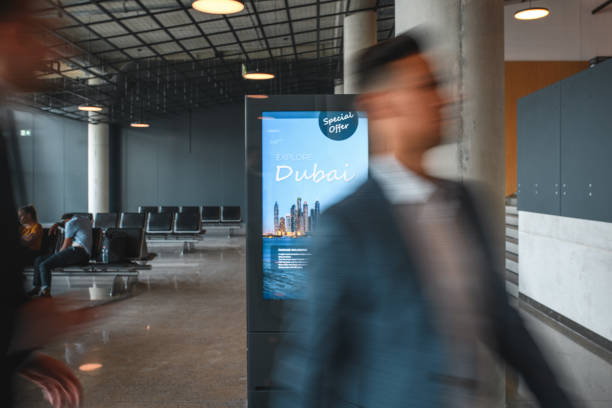 istock Asian Businessman At Departures Terminal 2160708643