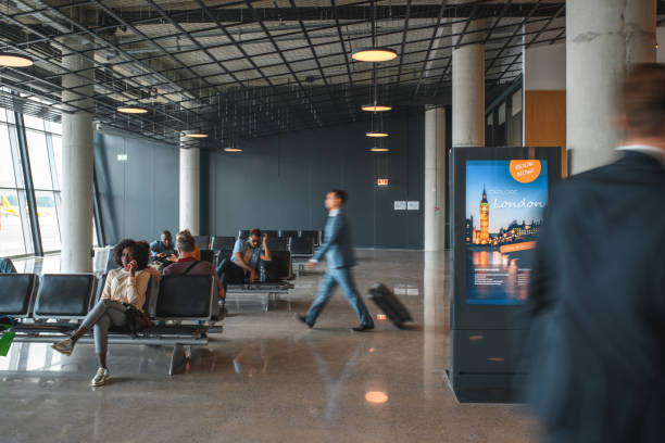 istock Asian Businessman At Departures Terminal 2160708649