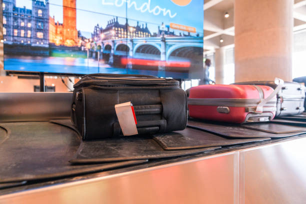 Bags and luggage moving on the baggage belt at the airport.