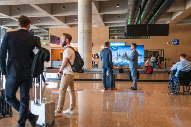 istock Mixed Race Males At The Airport 2160709367