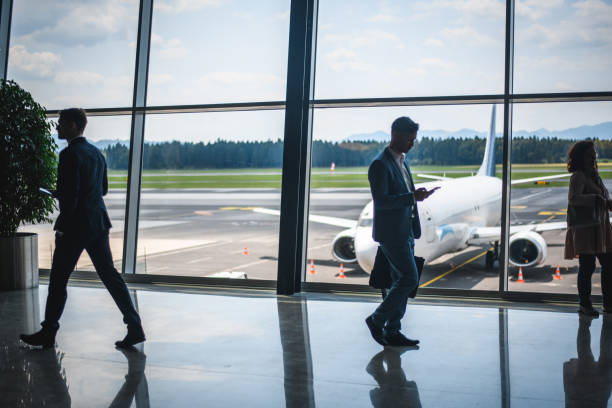 istock Diverse People Waiting For Their Flight At The Airport 2160710296