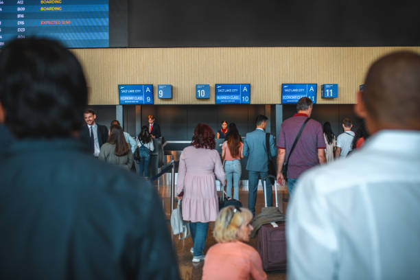 istock People Waiting For A Check In At The Airport 2160710458