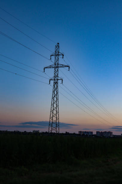 istock Power lines at evening. Electrical equipment. 2160711663