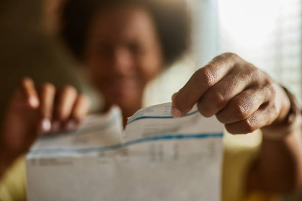 istock Tearing financial bill! 2160717845