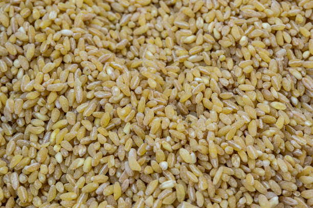 Close-up view of stacked wheats