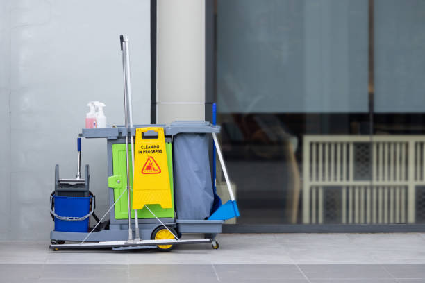 istock A cleaning cart with a yellow sign on it 2160722913