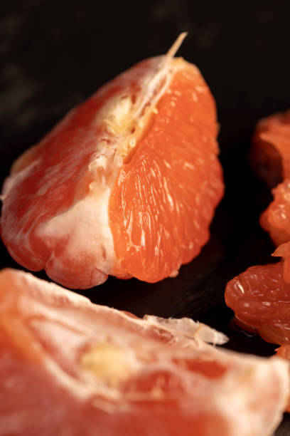 istock slices of peeled grapefruit close-up 2160723413