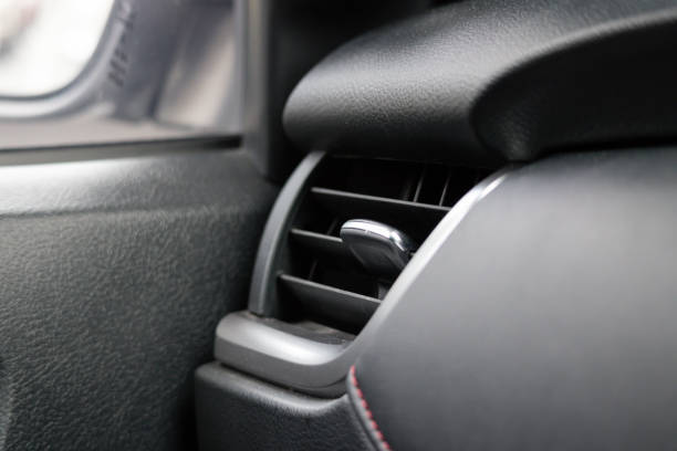 istock A black car interior with a black air vent 2160723448