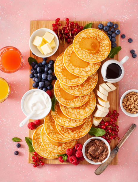 istock american pancake board with berries maple syrup butter 2160723782