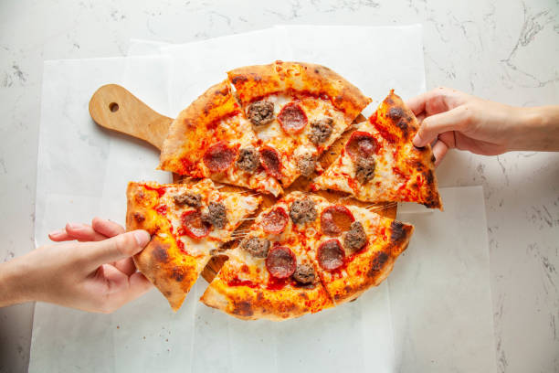 istock Naples authentic brick oven pizza, pepperoni and all meat 2160723914