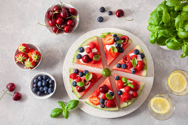 istock watermelon pizza slices with yogurt and berries, summer dessert 2160724007