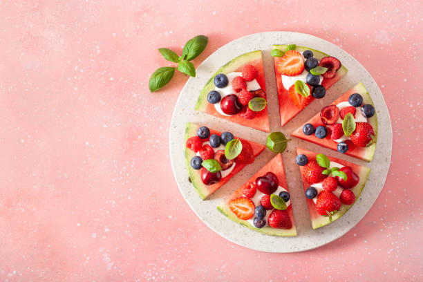 istock watermelon pizza slices with yogurt and berries, summer dessert 2160724079
