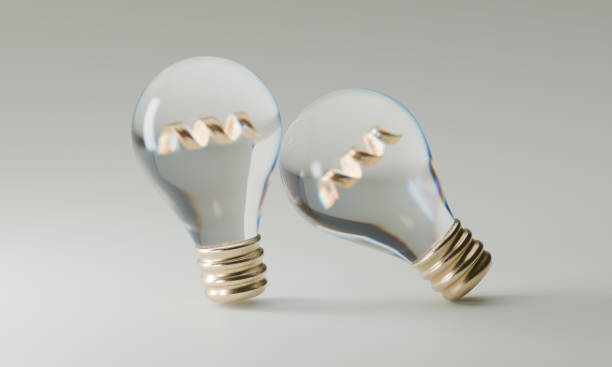 istock two light bulb with gold details isolated on white background 2160725000