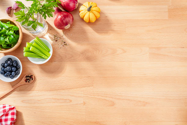 istock Fresh organic cooking ingredients on hardwood background. Copy space. 2160725050
