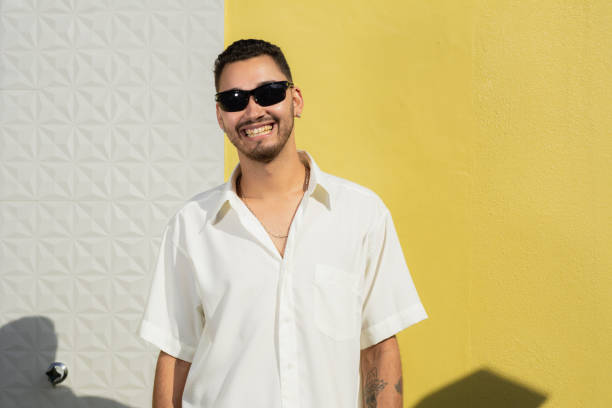 istock Handsome and stylish young man wearing sunglasses smiling. 2160728496