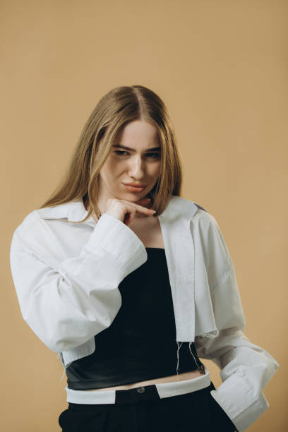 istock Young woman over isolated beige background having doubts 2160733977